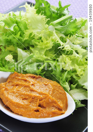 escarole endive with romesco sauce, a typical salad from Catalon escarole endive with romesco sauce, a typical salad from Catalon 19439980