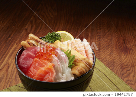 Bowl of rice topped with sashimi  19441797