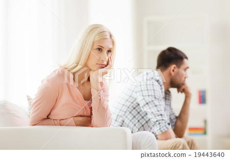 unhappy couple having argument at home unhappy couple having argument at home 19443640
