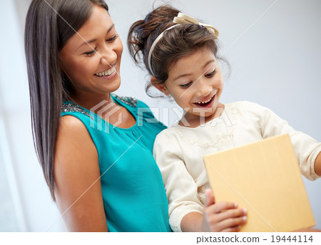 happy mother and child with gift box happy mother and child with gift box 19444114