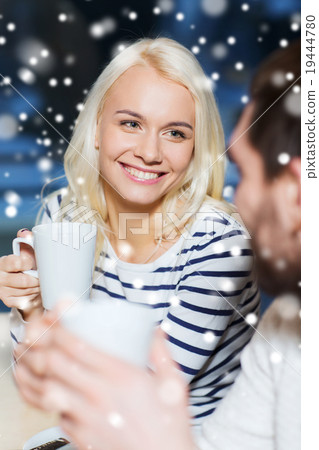 happy couple meeting and drinking tea or coffee 19444780