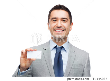 smiling businessman in suit showing visiting card smiling businessman in suit showing visiting card 19445014