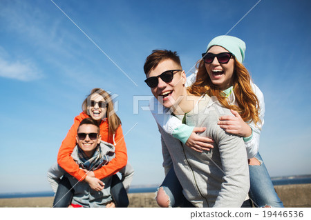 happy friends in shades having fun outdoors happy friends in shades having fun outdoors 19446536