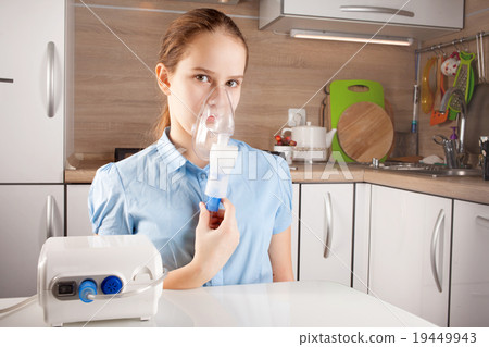Girl doing inhalation 19449943