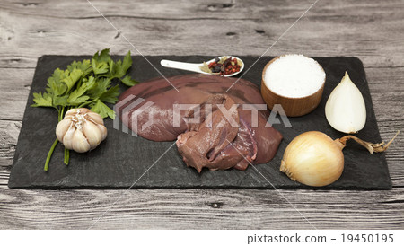 Pieces of fresh raw beef liver 19450195