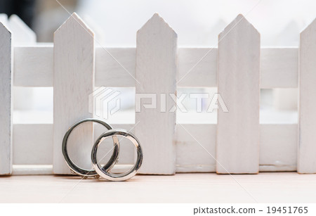 Two wedding rings made of white gold closeup 19451765