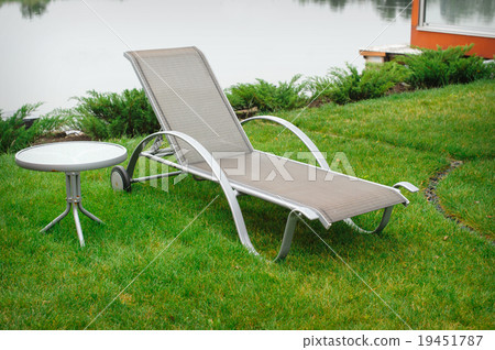 chaise lounge on the banks of the river chaise lounge on the banks of the river 19451787