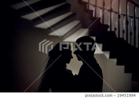 silhouette of the bride and groom at a wedding silhouette of the bride and groom at a wedding 19451994