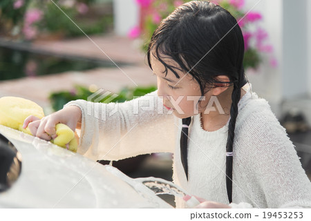 Beautiful asian child washing car 19453253