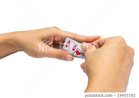 Playing cards in hand isolated on white background 19455502
