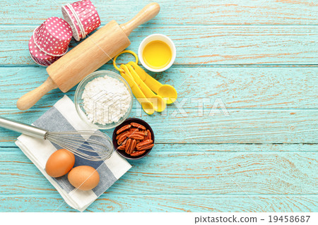 Baking background with ingredients and utensils Baking background with ingredients and utensils 19458687