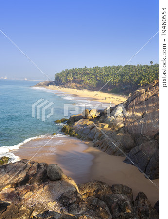 seashore with stones and palm trees. India. Kerala seashore with stones and palm trees. India. Kerala 19460553