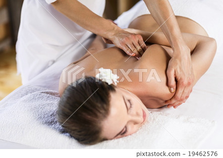 Woman enjoying massage. 19462576