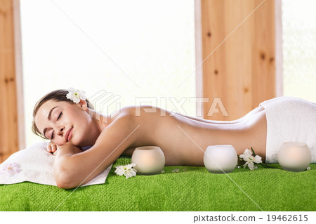 Young woman lying on massage  19462615