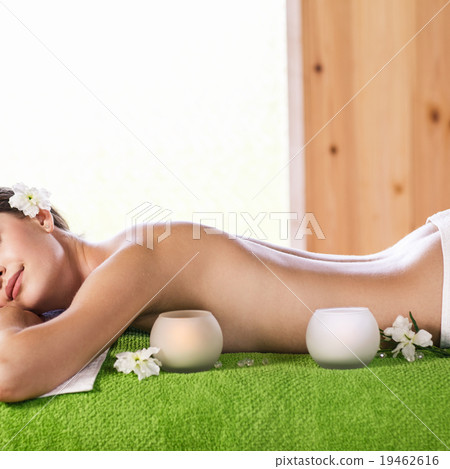 Young woman lying on massage  19462616