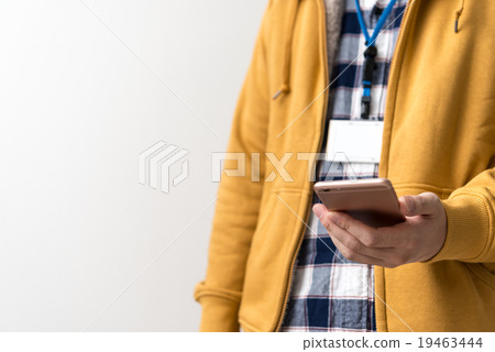 Employees touching a smartphone Employees touching a smartphone 19463444