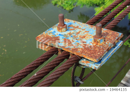 rusty wire rope sling of the part of the bridge. rusty wire rope sling of the part of the bridge. 19464135