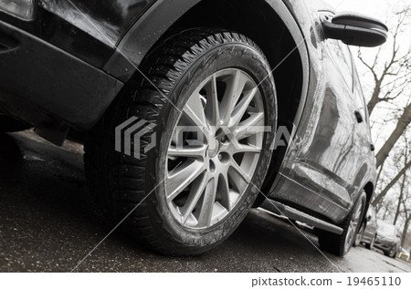 Closeup wide angle photo fragment of black car 19465110