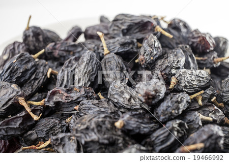 raisin on a white background raisin on a white background 19466992