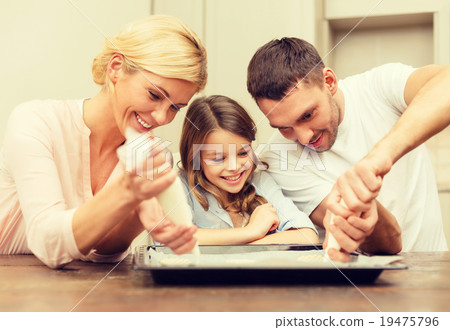 happy family in making cookies at home happy family in making cookies at home 19475796