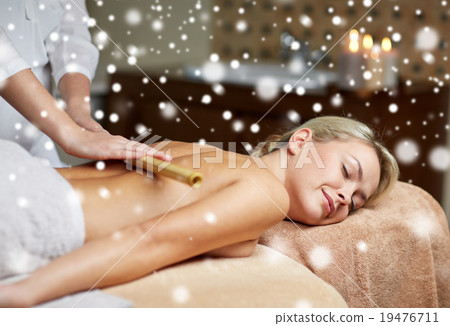 close up of woman lying and having massage in spa 19476711