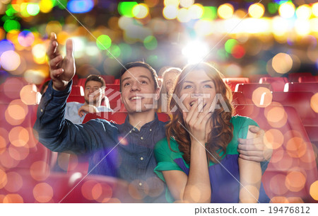 happy friends watching movie in theater happy friends watching movie in theater 19476812