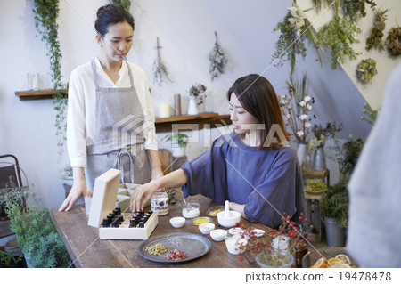A woman enjoying organic cosmetics 19478478