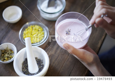 A woman enjoying organic cosmetics 19478493