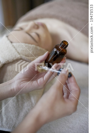 A woman enjoying aroma esthetics 19478533