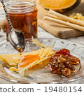 The slices of cheese with confiture and walnuts 19480154
