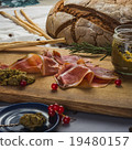 Bacon slices surrounded by cranberry 19480157