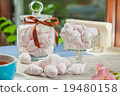 The meringue kisses in the glass vase and jars 19480158
