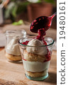 Layered dessert in glasses 19480161