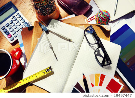 Messy Designer Table Office Supply Concept Messy Designer Table Office Supply Concept 19497447