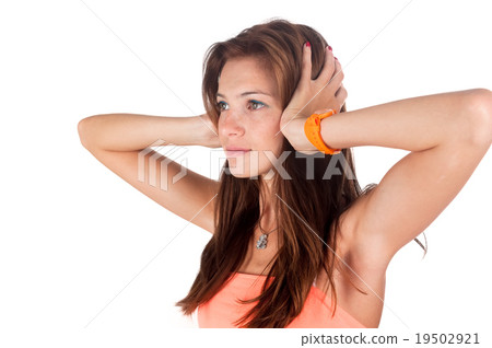 Hear no evil. Young pretty woman covering her ears 19502921