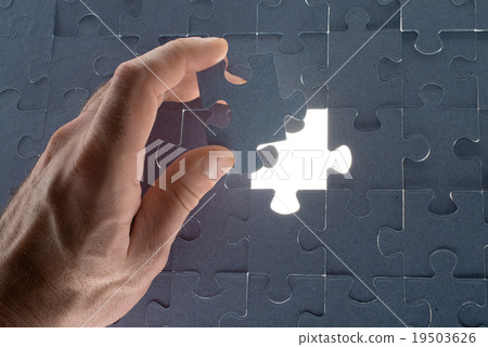 Missing jigsaw puzzle piece with light glow Missing jigsaw puzzle piece with light glow 19503626