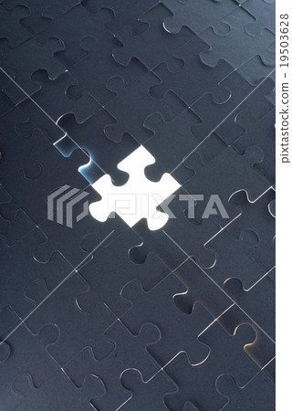 Missing jigsaw puzzle piece with light glow Missing jigsaw puzzle piece with light glow 19503628