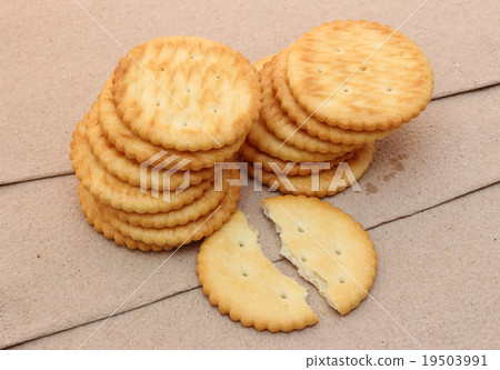 crackers on brown paper background crackers on brown paper background 19503991