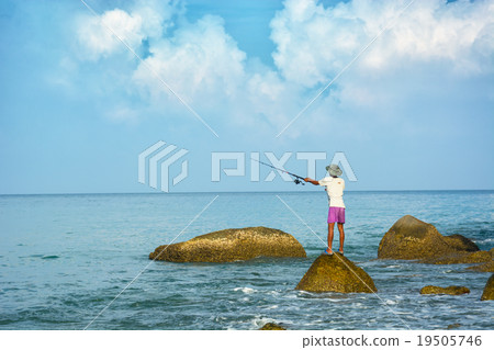 Local man fishing with rod 19505746