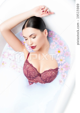 Cheerful healthy girl is having a bathtub Cheerful healthy girl is having a bathtub 19515989