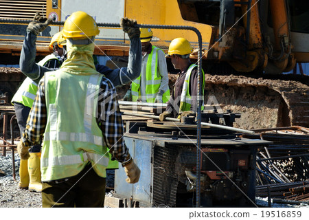 Workers working at the bar bending yard 19516859