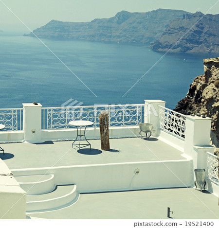 white terrace overlooking sea in Oia, Santorini 19521400