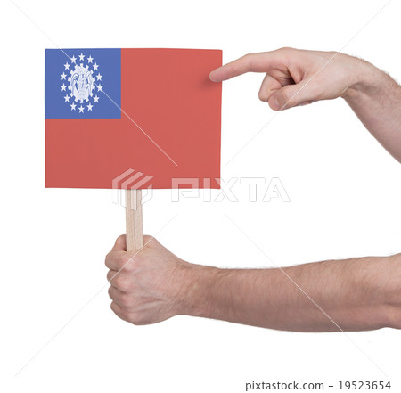 Hand holding small card - Flag of Myanmar Hand holding small card - Flag of Myanmar 19523654
