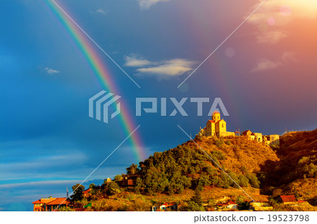 Thabori monastery on a hill with rainbow behind Thabori monastery on a hill with rainbow behind 19523798