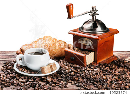 cup of warm coffee and coffee grinder isolated cup of warm coffee and coffee grinder isolated 19525874