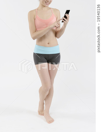 A style young lady with a smartphone 19540136