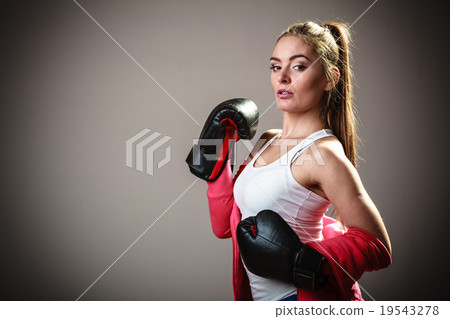 Sport boxer woman in black gloves boxing 19543278