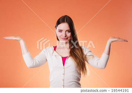 Smiling woman holding open palms empty hands 19544191