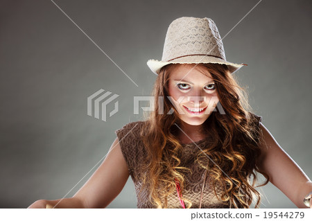 Mysterious enigmatic intriguing woman girl in hat. Mysterious enigmatic intriguing woman girl in hat. 19544279