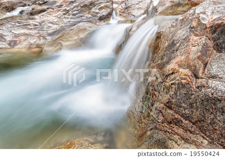 Manora Waterfall and stone in tropical forest Manora Waterfall and stone in tropical forest 19550424